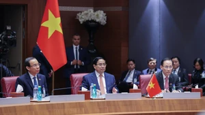 Prime Minister Pham Minh Chinh during the talks with his Algerian counterpart Sifi Ghrieb. (Photo: VGP)