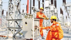 The resolution affirms the state sector as a particularly important component of the socialist-oriented market economy. (Photo: Hai Nam)