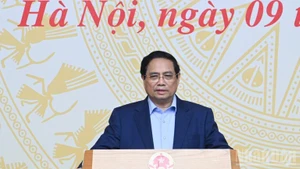 Prime Minister Pham Minh Chinh on October 9 chairs a nationwide teleconference to launch the National Target Programme on Drug Prevention and Control to 2030. (Photo: Tran Hai)