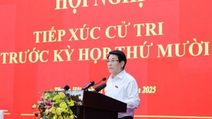 State President Luong Cuong speaks at the meeting with voters in HCM City on October 1, 2025 (Photo: Xuan Ky)