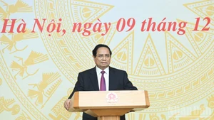 Prime Minister Pham Minh Chinh speaks at the 25th meeting of the National Steering Committee for Combating IUU Fishing on December 9. (Photo: Tran Hai)