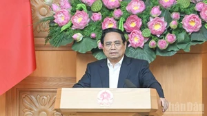 Prime Minister Pham Minh Chinh speaks at the 22nd meeting of the State steering committee for national key projects in the transport sector. (Photo: Tran Hai)