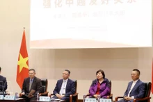 Experts and scholars at the press conference (Photo: VNA)