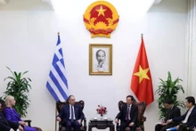 The meeting between Deputy Prime Minister Ho Quoc Dung (right) and First Vice President of the Hellenic Parliament Ioannis Plakiotakis in Ha Noi on March 3, 2026 (Photo VNA)