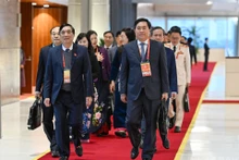 Delegates from the Phu Tho Provincial Party Committee delegation arrive to attend the session. (Photo: TRAN HAI)