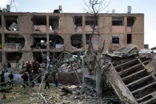 A building destroyed by a missile strike in Dimona, Israel, on March 22, 2026. (Photo: Xinhua/VNA)