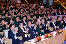 Party General Secretary To Lam, National Assembly Chairman Tran Thanh Man, and other leaders at the concert. (Photo: VNA)