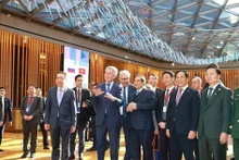 Prime Minister Pham Minh Chinh visits and works with leaders of Novatek Group. (Photo: VNA)