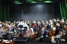 Artists rehearse in preparation for the programme. (Photo: Organising Committee)