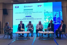 Delegates in discussion at the conference.