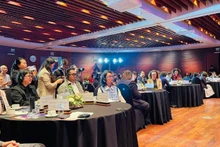Participants listen to and share experiences in building creative cities. (Photo: NDO)