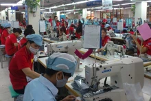 Production of export garments at Garment 10 Corporation.