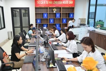In pictures: Ha Noi's first working day of two-tier local governance model