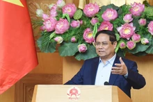 Prime Minister Pham Minh Chinh speaks at the meeting on the implementation of the national achievements exhibition marking the 80th anniversary of National Day. (Photo: NDO)