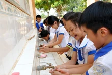 Strengthening healthcare and personal hygiene for children towards a healthy society. (Photo: THANH TRUC)