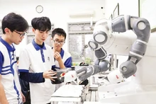 Students in a laboratory at the University of Technology under the Viet Nam National University, Ha Noi.