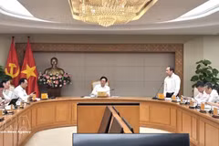 The meeting chaired by Deputy Prime Minister Ho Quoc Dung in Ha Noi on April 20 (Photo: VNA) 