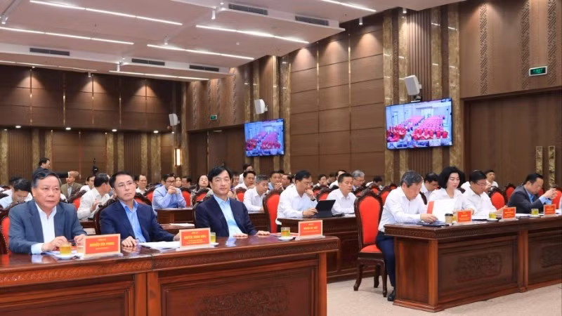 Delegates attend the conference