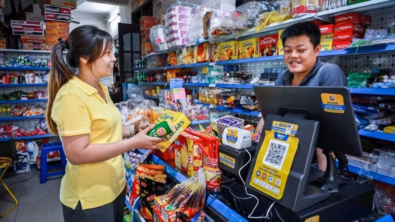 Business households and individual business owners will officially pay tax under the declaration-based method (tax calculated on actual revenue) from January 1, 2026. (Photo: DAT THANH)