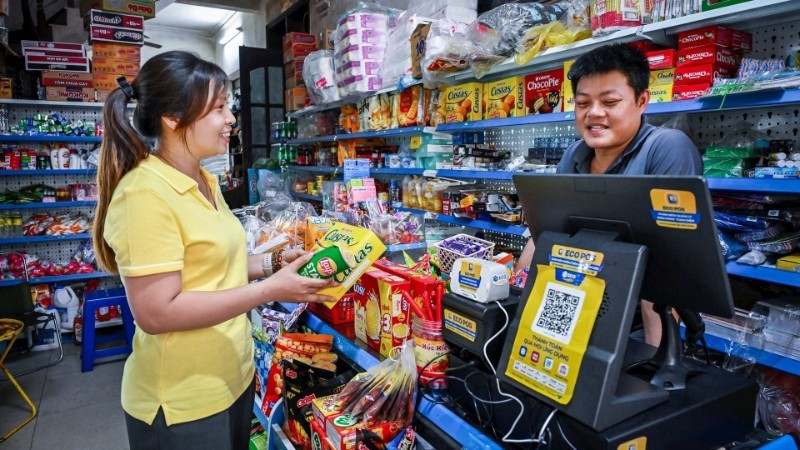 Business households and individual business owners will officially pay tax under the declaration-based method (tax calculated on actual revenue) from January 1, 2026. (Photo: DAT THANH)