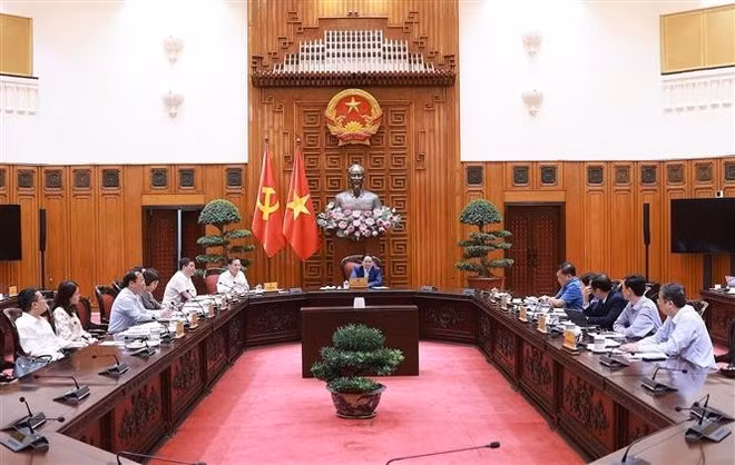 Participants at the meeting. (Photo: VNA)