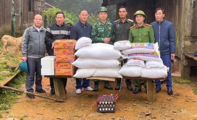 Providing food and supplies to Lao border protection forces isolated for days by floodwaters.