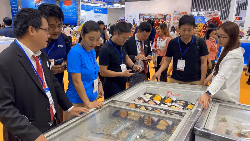 A booth introducing seafood products of Go Dang Joint Stock Company at Vietfish Fair 2025. (Photo: HOANG YEN)