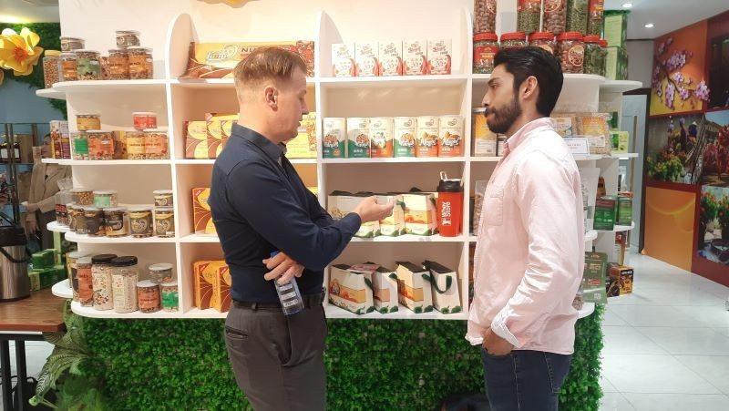 Foreign investors examine products of enterprises from Ho Chi Minh City displayed at the Investment and Trade Promotion Centre of Ho Chi Minh City.