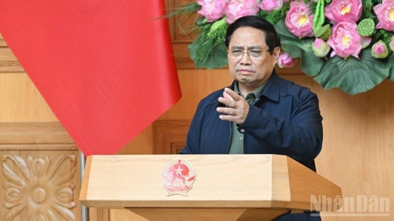 Prime Minister Pham Minh Chinh speaks at an emergency meeting on measures to address the aftermath of historic floods in central Viet Nam. (Photo: Tran Hai)