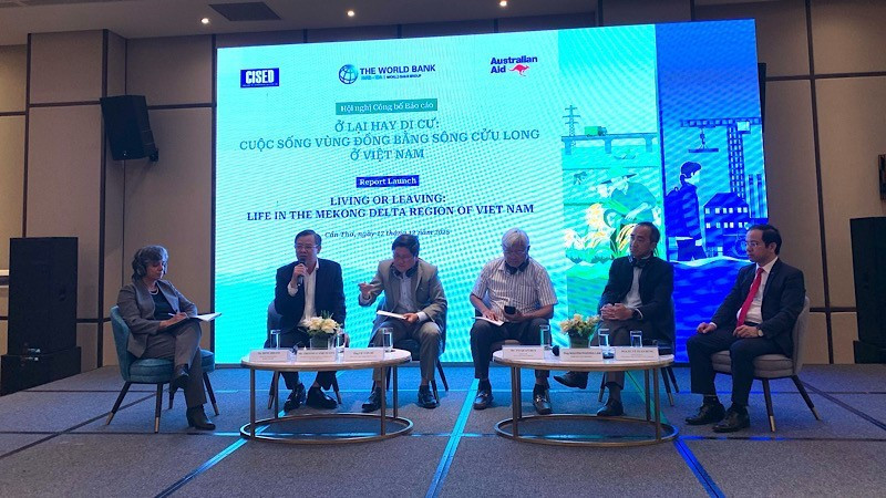 Delegates in discussion at the conference.