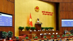 With 441 out of 445 lawmakers voting in favour, the Law on Digital Technology Industry is adopted (Photo: VNA)