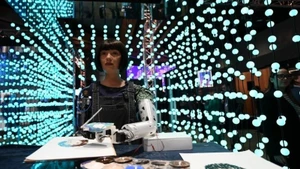 Artist robot Ai-Da paints at 2024 AI For Good Global Summit, Switzerland, May 30, 2024. (Photo: Xinhua/VNA)