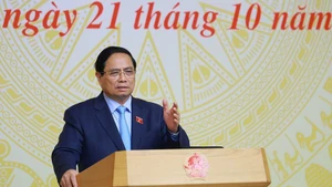 Prime Minister Pham Minh Chinh chairs the 18th meeting of the National Steering Committee for Combating Illegal, Unreported and Unregulated Fishing. (Photo: VNA)
