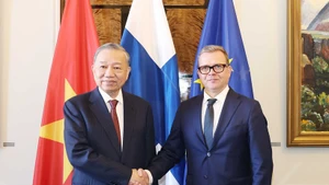 General Secretary of the Communist Party of Viet Nam Central Committee To Lam (L) and Finnish Prime Minister Petteri Orpo at their meeting in Helsinki on October 21 afternoon (local time). (Photo: VNA)