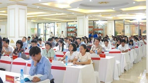 Delegates attend the conference