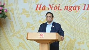 Prime Minister Pham Minh Chinh delivering his speech at the meeting.