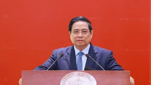 Prime Minister Pham Minh Chinh speaks at the State Bank of Viet Nam (SBV)'s Ha Noi conference to review its 2025 performance and launch tasks for 2026 on December 31. (Photo: VNA)