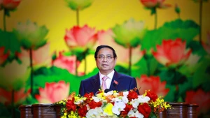 Prime Minister Pham Minh Chinh, who is also Chairman of the Central Council for Emulation and Commendation, launches the patriotic emulation movement for the 2026-2030 period. (Photo: VNA)
