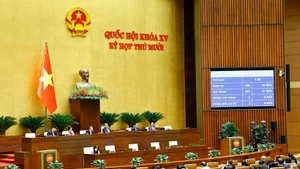The December 11 plenary sitting of the 15th NA's 10th session (Photo: VNA)
