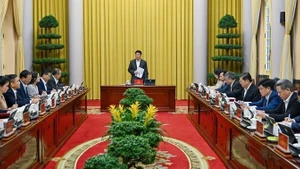 State President Luong Cuong chairs a meeting with the Presidential Office on December 31 to review its December performance and set key duties for January 2026. (Photo: qdnd.vn)