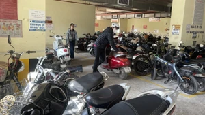 The electric vehicle parking area at CT2 Thach Ban apartment building is packed with vehicles.