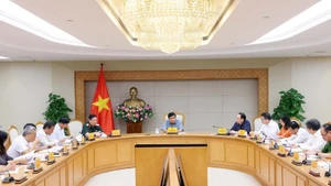 At the meeting (Photo: VNA)