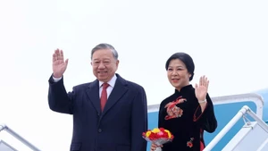 Party General Secretary To Lam and his spouse (Photo: VNA)