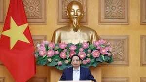 Prime Minister Pham Minh Chinh speaks at the meeting with the Policy Advisory Council in Ha Noi on March 7, 2026. (Photo: NDO) 