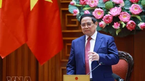 Prime Minister Pham Minh Chinh addresses the meeting. (Photo: VNA)