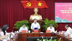 Politburo member and Minister of Agriculture and Environment Tran Duc Thang speaks at the working session