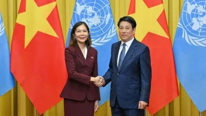 State President Luong Cuong (R) and Pauline Tamesis, United Nations (UN) Resident Coordinator in Viet Nam. (Photo: NDO/Thuy Nguyen)