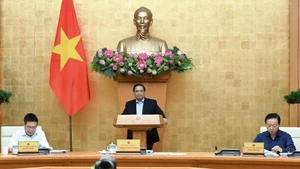 Prime Minister Pham Minh Chinh chairs the Government’s second thematic session on law-making in September. (Photo: NDO/Tran Hai)