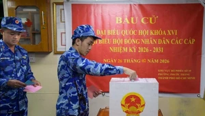 Voters aboard Coast Guard ship CSB 6008 in Ho Chi Minh City cast their ballots in the election of deputies to the National Assembly and People’s Councils at all levels. (Photo: VNA)