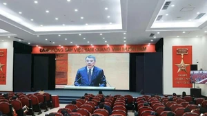 Party members of the Viet Nam News Agency attend the event via videoconferencing on February 7. (Photo: VNA)